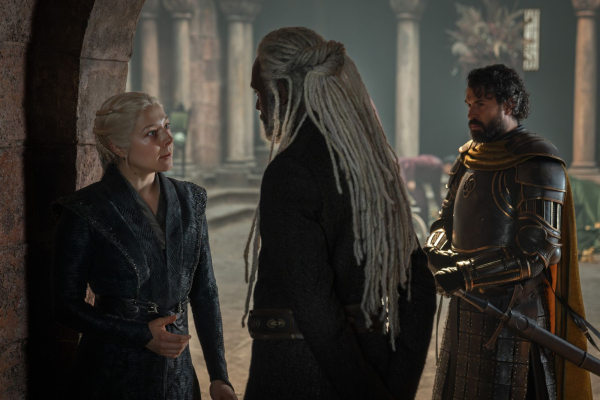 Emma D'Arcy as Rhaenyra Targaryen Steve Touissant as Lord Corlys Velaryon and Tom Cullen as TK in a still from the The...